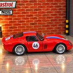 A red die-cast model sports car with blue and white racing stripes, number 46 on the side door, displayed on a tiled floor in front of a brick wall backdrop with automotive-themed wall decals.
