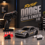 A 1:43 scale remote control model car in the style of a gray Dodge Challenger with yellow racing stripes, displayed alongside its black handheld transmitter, orange traffic cones, spare wheels, a USB charging cable, and a screwdriver on a polished gray tabletop. A large 'RUSH DODGE CHALLENGER 1:43 SCALE' sign is visible in the background.
