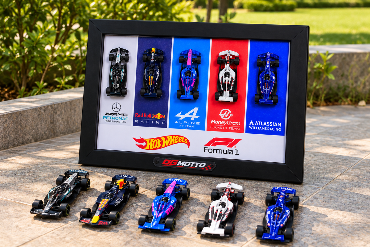 OG Motto Hot Wheels Formula 1 A4 display frame with five team cars, styled on patio tiles in a garden