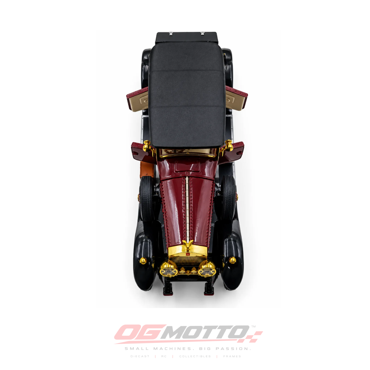 A vintage-style model car photographed from directly above on a white background, with a red body, black body panels and roof, and gold trim details. An OG MOTTO logo appears at the bottom of the image.